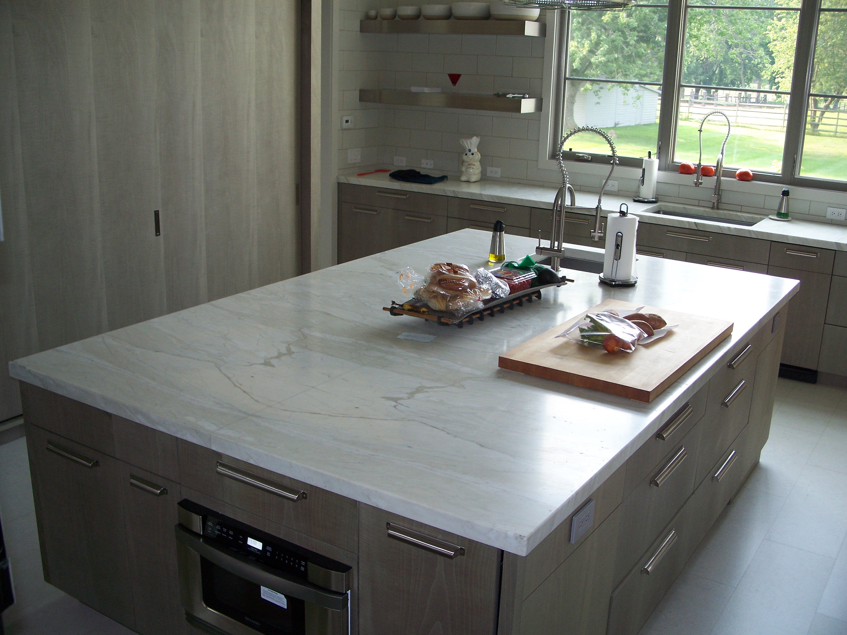 2" Thickness Calacatta Gold Honed Finish Marble Island with Bookmatched Seam Down Center